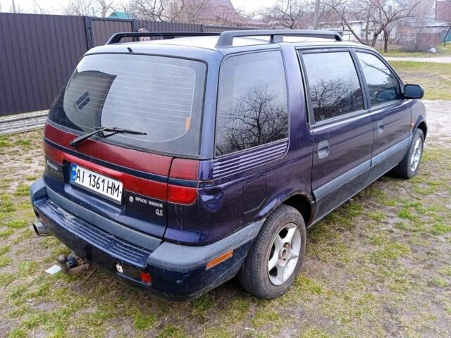 Мицубиси Спейс Вагон 1996 в Тараще на Automoto.ua Синий Мицубиси Спейс Вагон, объемом двигателя 2 л и пробегом 335 тыс. км за 1800 $, фото 3 на Automoto.ua