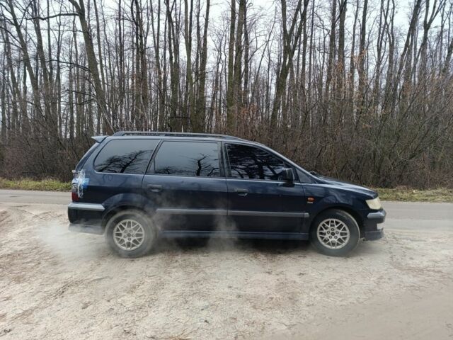 Синий Мицубиси Спейс Вагон, объемом двигателя 2.4 л и пробегом 333 тыс. км за 1000 $, фото 7 на Automoto.ua