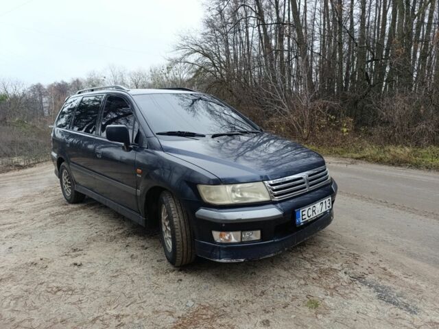 Синий Мицубиси Спейс Вагон, объемом двигателя 2.4 л и пробегом 333 тыс. км за 1000 $, фото 3 на Automoto.ua