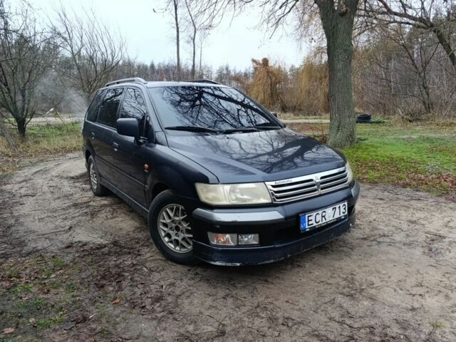 Синий Мицубиси Спейс Вагон, объемом двигателя 2.4 л и пробегом 333 тыс. км за 1000 $, фото 2 на Automoto.ua