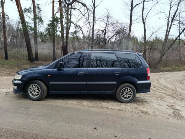 Синий Мицубиси Спейс Вагон, объемом двигателя 2.4 л и пробегом 333 тыс. км за 1000 $, фото 4 на Automoto.ua