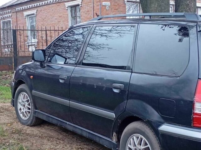 Синій Міцубісі Спейс Вагон, об'ємом двигуна 2.4 л та пробігом 1 тис. км за 1500 $, фото 1 на Automoto.ua