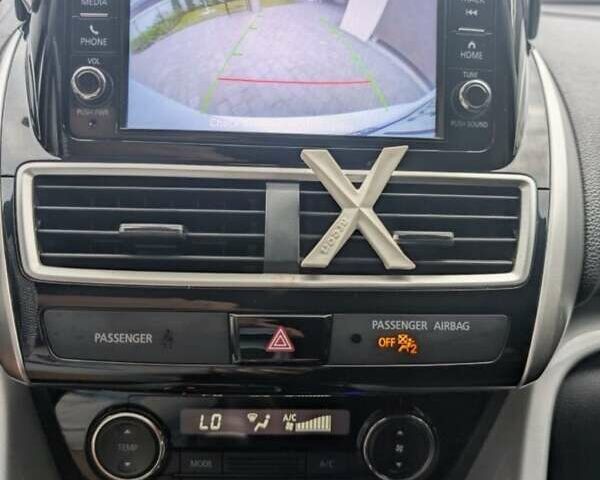 Білий Міцубісі Eclipse Cross, об'ємом двигуна 1.5 л та пробігом 140 тис. км за 14000 $, фото 6 на Automoto.ua