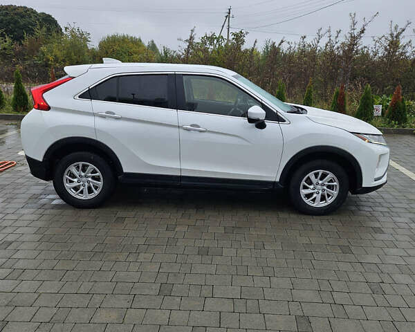 Белый Мицубиси Eclipse Cross, объемом двигателя 1.5 л и пробегом 187 тыс. км за 13999 $, фото 2 на Automoto.ua