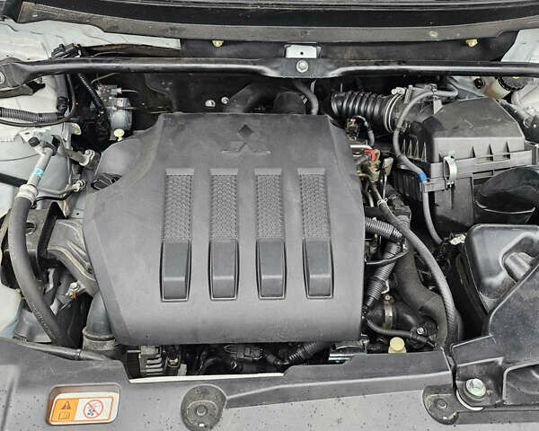 Белый Мицубиси Eclipse Cross, объемом двигателя 1.5 л и пробегом 187 тыс. км за 13999 $, фото 11 на Automoto.ua