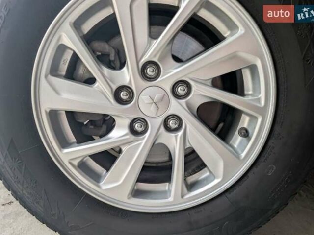 Білий Міцубісі Eclipse Cross, об'ємом двигуна 1.5 л та пробігом 140 тис. км за 14000 $, фото 9 на Automoto.ua
