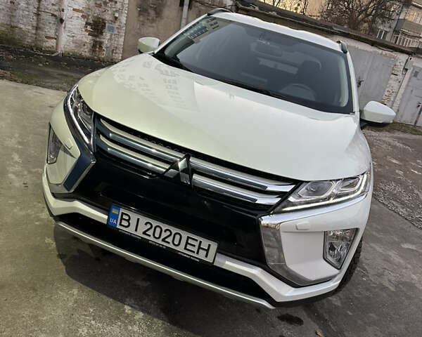 Белый Мицубиси Eclipse Cross, объемом двигателя 1.5 л и пробегом 21 тыс. км за 23750 $, фото 3 на Automoto.ua