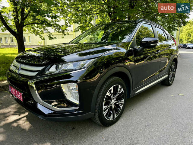 Черный Мицубиси Eclipse Cross, объемом двигателя 1.5 л и пробегом 114 тыс. км за 16000 $, фото 1 на Automoto.ua