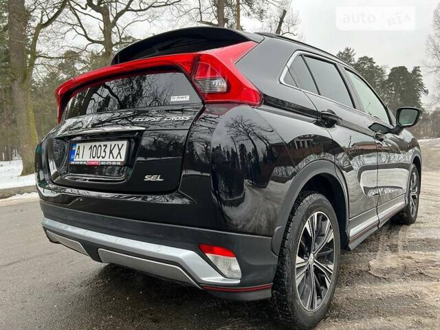 Чорний Міцубісі Eclipse Cross, об'ємом двигуна 1.5 л та пробігом 56 тис. км за 19500 $, фото 42 на Automoto.ua