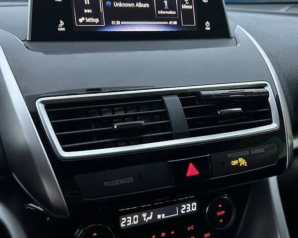 Черный Мицубиси Eclipse Cross, объемом двигателя 1.5 л и пробегом 135 тыс. км за 16800 $, фото 9 на Automoto.ua