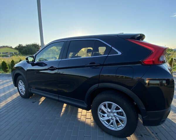 Черный Мицубиси Eclipse Cross, объемом двигателя 1.5 л и пробегом 121 тыс. км за 14300 $, фото 2 на Automoto.ua