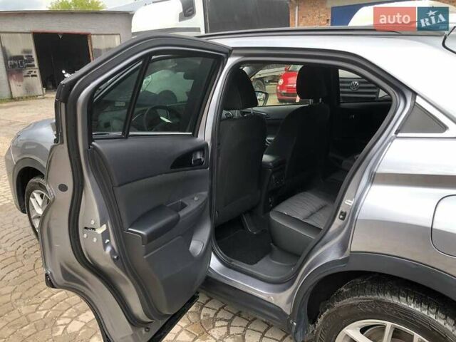 Сірий Міцубісі Eclipse Cross, об'ємом двигуна 1.5 л та пробігом 53 тис. км за 16000 $, фото 14 на Automoto.ua