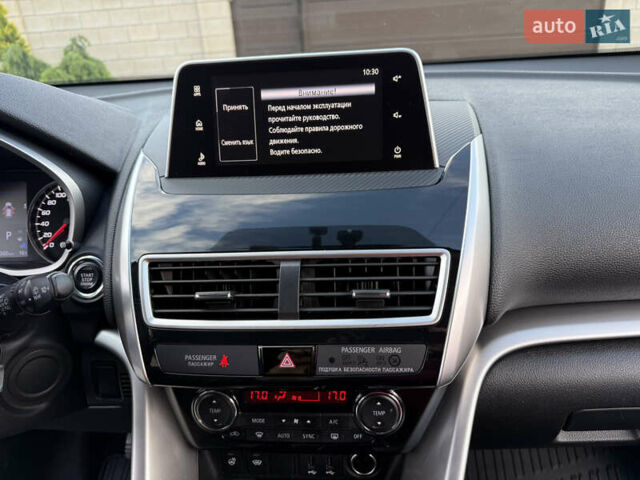 Синий Мицубиси Eclipse Cross, объемом двигателя 1.5 л и пробегом 92 тыс. км за 18700 $, фото 52 на Automoto.ua