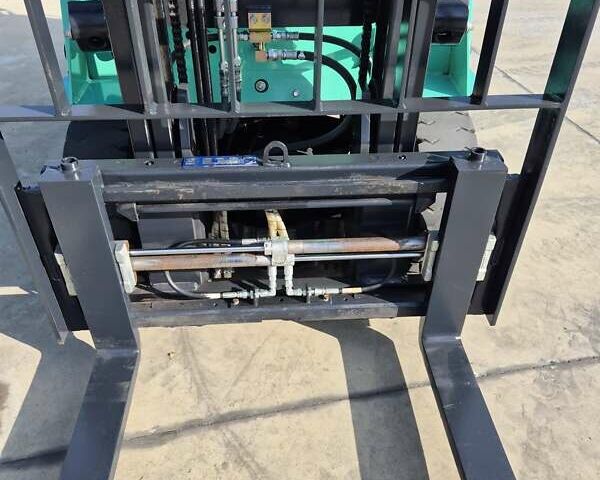 Зеленый Мицубиси FGE, объемом двигателя 2 л и пробегом 5 тыс. км за 12045 $, фото 5 на Automoto.ua