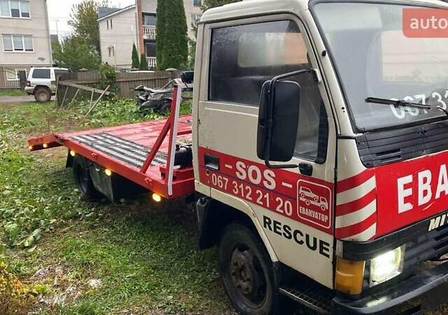 Белый Мицубиси Fuso Canter, объемом двигателя 2.48 л и пробегом 300 тыс. км за 7800 $, фото 2 на Automoto.ua