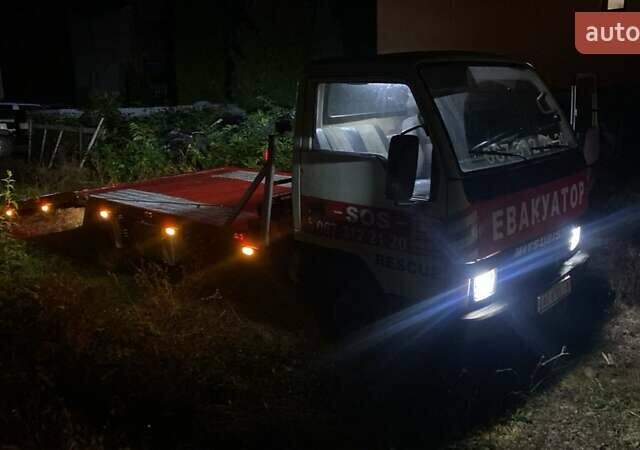 Белый Мицубиси Fuso Canter, объемом двигателя 2.48 л и пробегом 300 тыс. км за 7800 $, фото 7 на Automoto.ua