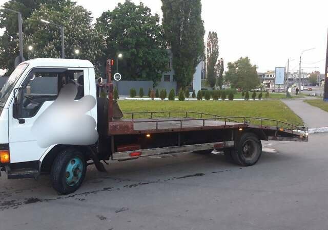 Білий Міцубісі Fuso Canter, об'ємом двигуна 3.3 л та пробігом 448 тис. км за 9500 $, фото 2 на Automoto.ua