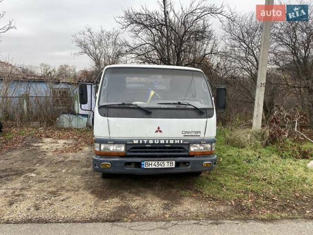 Белый Мицубиси Fuso Canter, объемом двигателя 3.9 л и пробегом 458 тыс. км за 13600 $, фото 1 на Automoto.ua