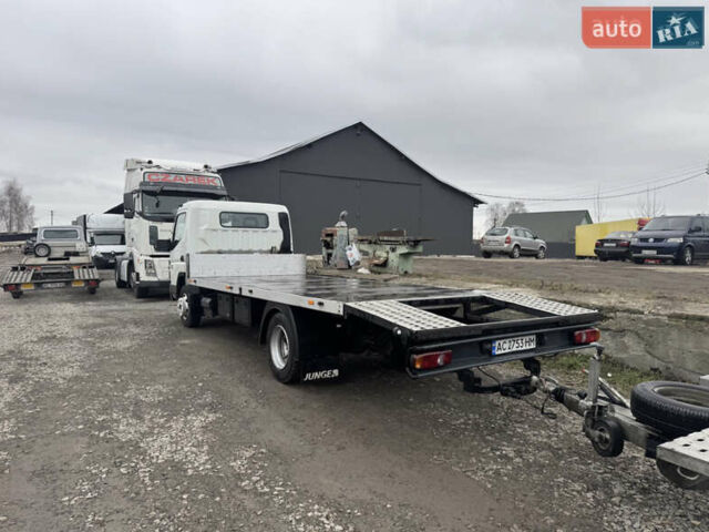 Белый Мицубиси Fuso Canter, объемом двигателя 3 л и пробегом 300 тыс. км за 14000 $, фото 1 на Automoto.ua