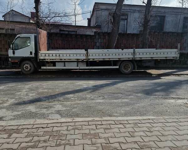 Белый Мицубиси Fuso Canter, объемом двигателя 3.91 л и пробегом 595 тыс. км за 6500 $, фото 2 на Automoto.ua