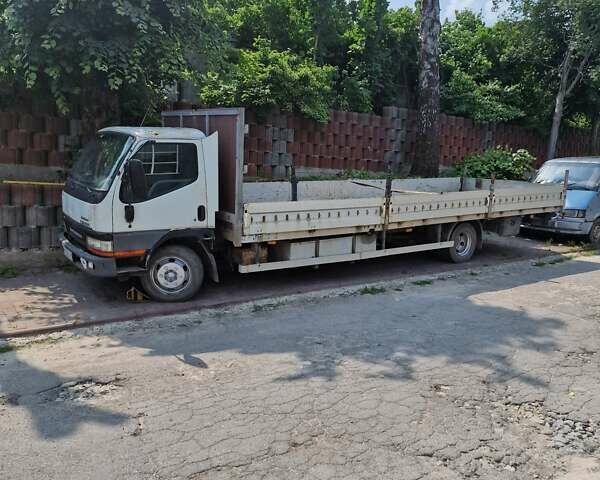 Белый Мицубиси Fuso Canter, объемом двигателя 3.91 л и пробегом 595 тыс. км за 6500 $, фото 1 на Automoto.ua