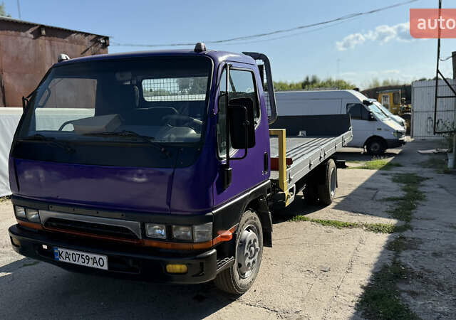 Фиолетовый Мицубиси Fuso Canter, объемом двигателя 3.91 л и пробегом 100 тыс. км за 12300 $, фото 4 на Automoto.ua