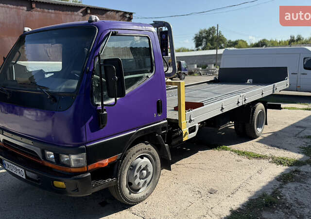 Фиолетовый Мицубиси Fuso Canter, объемом двигателя 3.91 л и пробегом 100 тыс. км за 12300 $, фото 5 на Automoto.ua