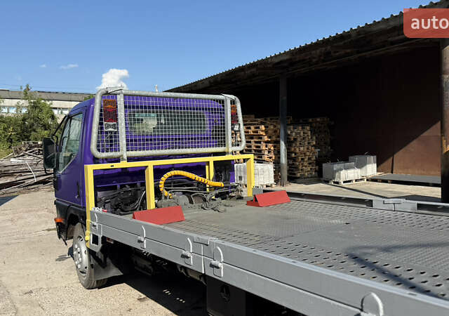 Фиолетовый Мицубиси Fuso Canter, объемом двигателя 3.91 л и пробегом 100 тыс. км за 12300 $, фото 9 на Automoto.ua