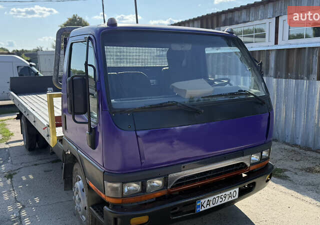 Фиолетовый Мицубиси Fuso Canter, объемом двигателя 3.91 л и пробегом 100 тыс. км за 12300 $, фото 3 на Automoto.ua