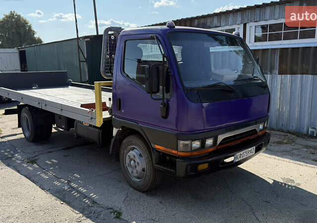 Фиолетовый Мицубиси Fuso Canter, объемом двигателя 3.91 л и пробегом 100 тыс. км за 12300 $, фото 2 на Automoto.ua