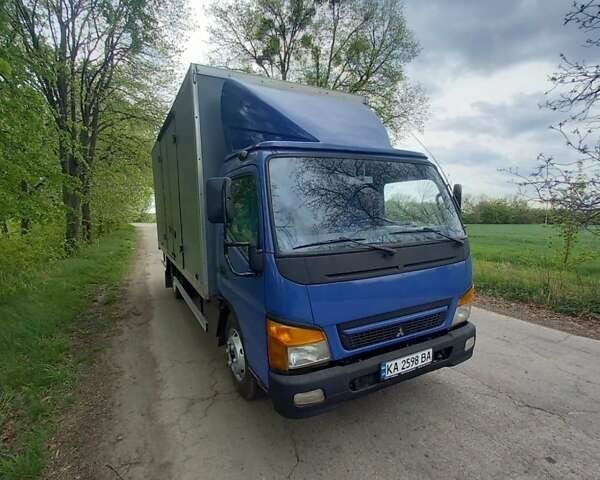 Фиолетовый Мицубиси Fuso Canter, объемом двигателя 3.9 л и пробегом 375 тыс. км за 11700 $, фото 1 на Automoto.ua