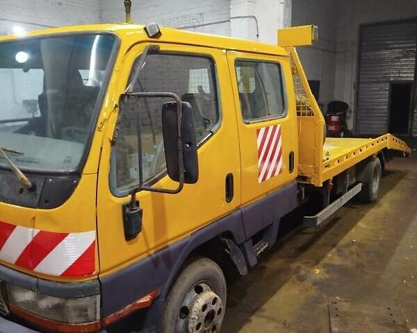 Желтый Мицубиси Fuso Canter, объемом двигателя 3.91 л и пробегом 300 тыс. км за 5200 $, фото 4 на Automoto.ua