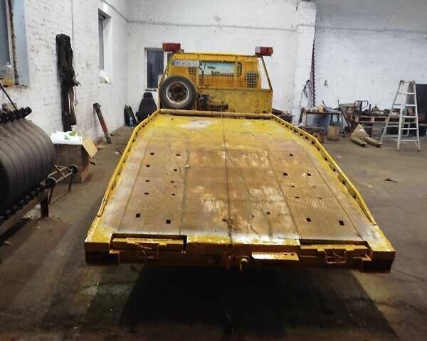 Желтый Мицубиси Fuso Canter, объемом двигателя 3.91 л и пробегом 300 тыс. км за 5200 $, фото 2 на Automoto.ua