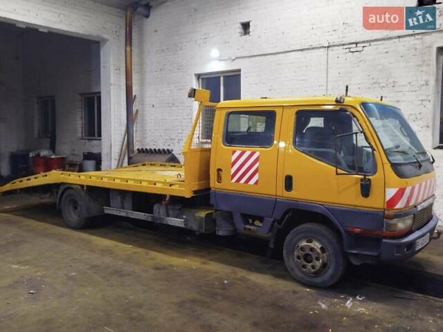 Желтый Мицубиси Fuso Canter, объемом двигателя 3.91 л и пробегом 300 тыс. км за 5200 $, фото 1 на Automoto.ua