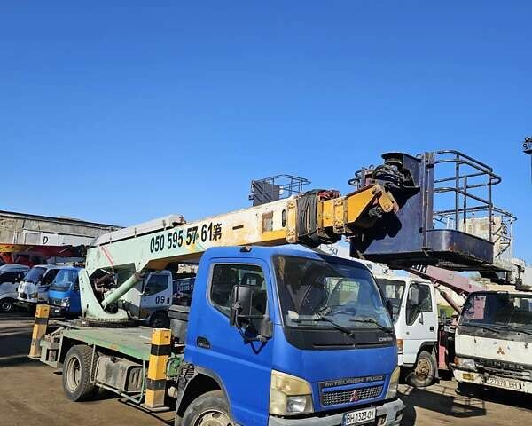 Синий Мицубиси Fuso Canter, объемом двигателя 4 л и пробегом 210 тыс. км за 40000 $, фото 2 на Automoto.ua