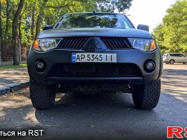 Чорний Міцубісі L200, об'ємом двигуна 2.5 л та пробігом 291 тис. км за 11999 $, фото 1 на Automoto.ua