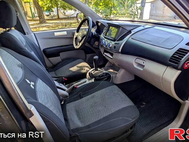 Чорний Міцубісі L200, об'ємом двигуна 2.5 л та пробігом 291 тис. км за 11999 $, фото 9 на Automoto.ua