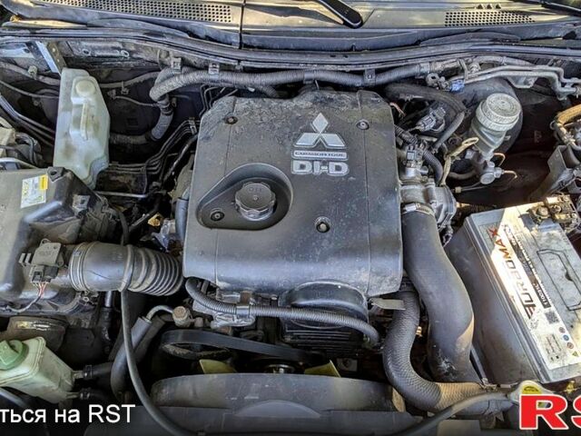 Чорний Міцубісі L200, об'ємом двигуна 2.5 л та пробігом 291 тис. км за 11999 $, фото 5 на Automoto.ua