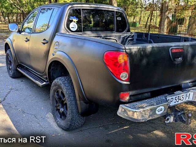 Чорний Міцубісі L200, об'ємом двигуна 2.5 л та пробігом 291 тис. км за 11999 $, фото 4 на Automoto.ua