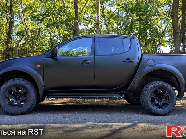 Чорний Міцубісі L200, об'ємом двигуна 2.5 л та пробігом 291 тис. км за 11999 $, фото 3 на Automoto.ua
