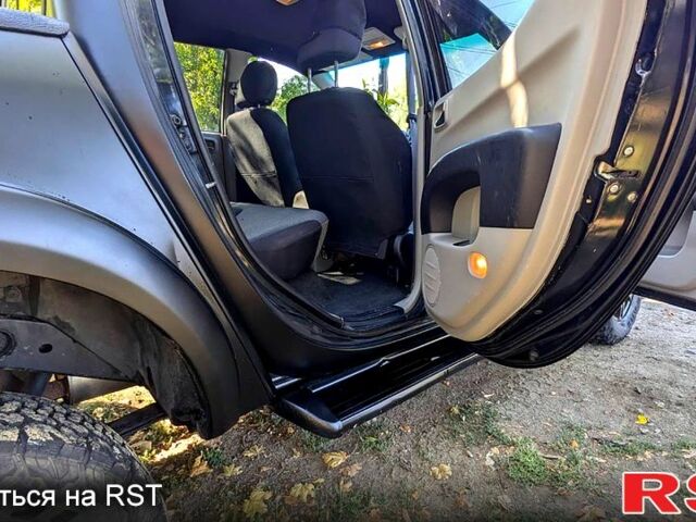 Чорний Міцубісі L200, об'ємом двигуна 2.5 л та пробігом 291 тис. км за 11999 $, фото 8 на Automoto.ua