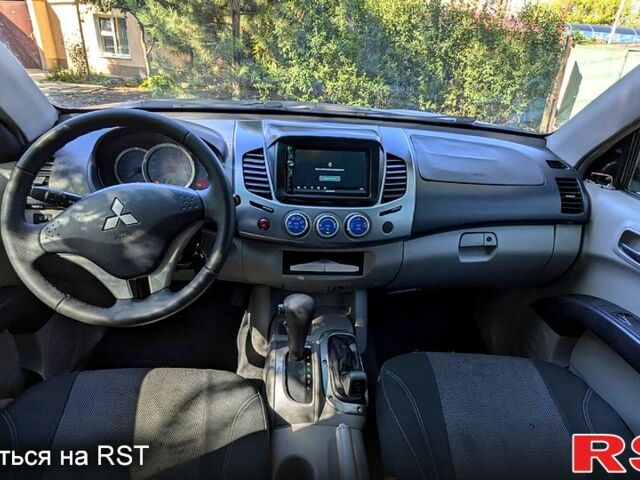 Чорний Міцубісі L200, об'ємом двигуна 2.5 л та пробігом 291 тис. км за 11999 $, фото 6 на Automoto.ua