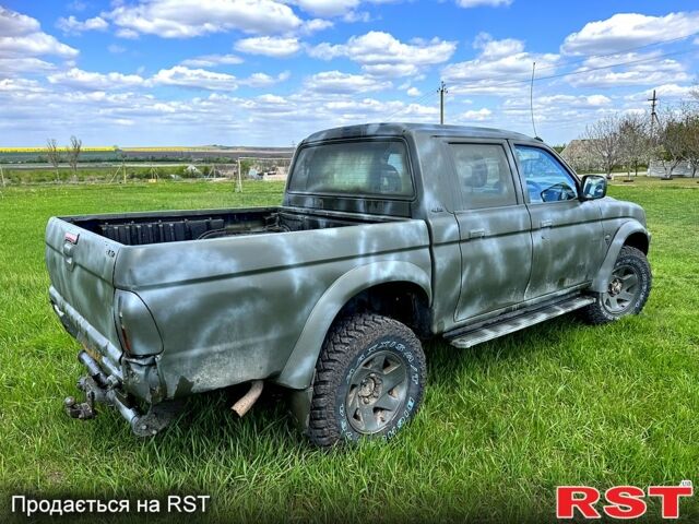 Мицубиси L200, объемом двигателя 2.5 л и пробегом 213 тыс. км за 4000 $, фото 5 на Automoto.ua
