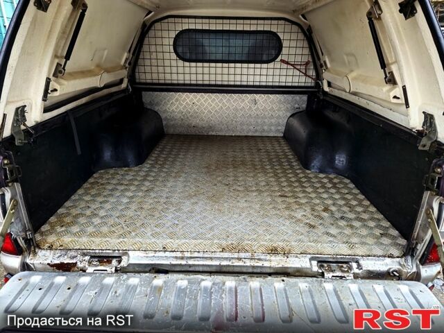 Мицубиси L200, объемом двигателя 2.5 л и пробегом 260 тыс. км за 5800 $, фото 1 на Automoto.ua