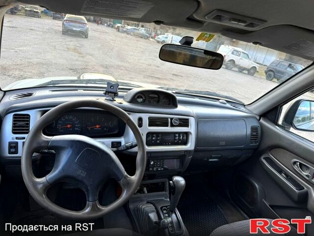 Серый Мицубиси L200, объемом двигателя 2.5 л и пробегом 213 тыс. км за 4800 $, фото 5 на Automoto.ua