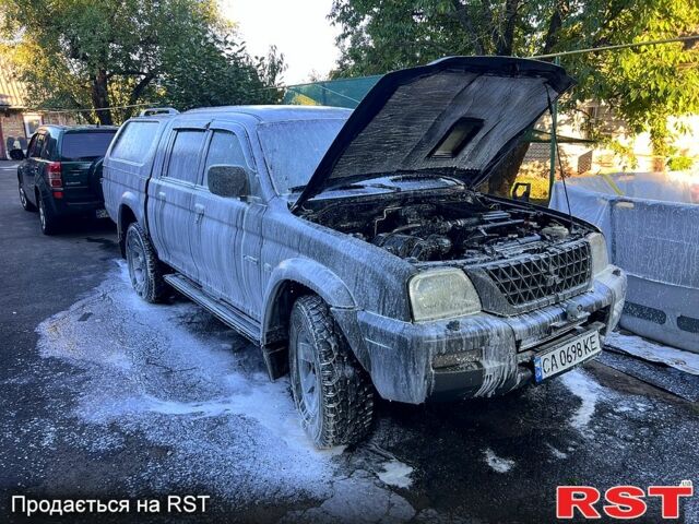 Синій Міцубісі L200, об'ємом двигуна 2.5 л та пробігом 374 тис. км за 10500 $, фото 11 на Automoto.ua