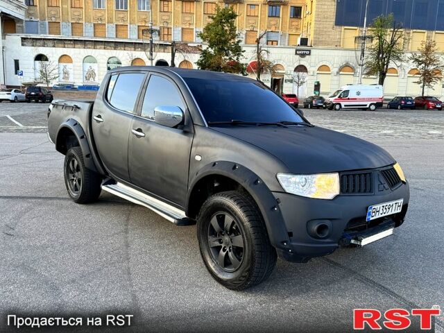 Синій Міцубісі L200, об'ємом двигуна 2.5 л та пробігом 140 тис. км за 8500 $, фото 1 на Automoto.ua