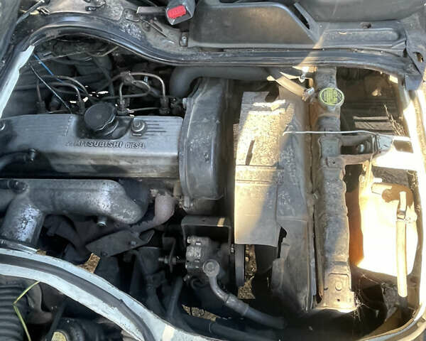 Белый Мицубиси L 300, объемом двигателя 2 л и пробегом 298 тыс. км за 1900 $, фото 20 на Automoto.ua