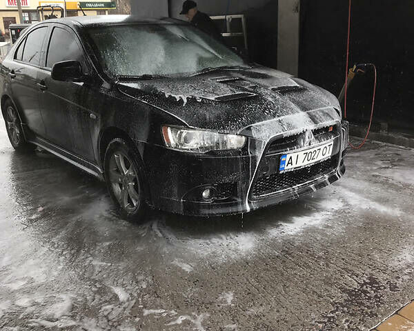 Чорний Міцубісі Lancer Ralliart, об'ємом двигуна 2 л та пробігом 136 тис. км за 5800 $, фото 1 на Automoto.ua