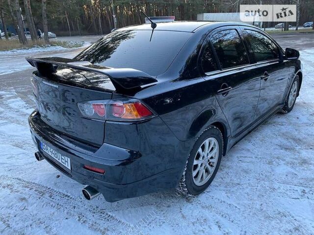 Черный Мицубиси Lancer Ralliart, объемом двигателя 2 л и пробегом 149 тыс. км за 10600 $, фото 71 на Automoto.ua